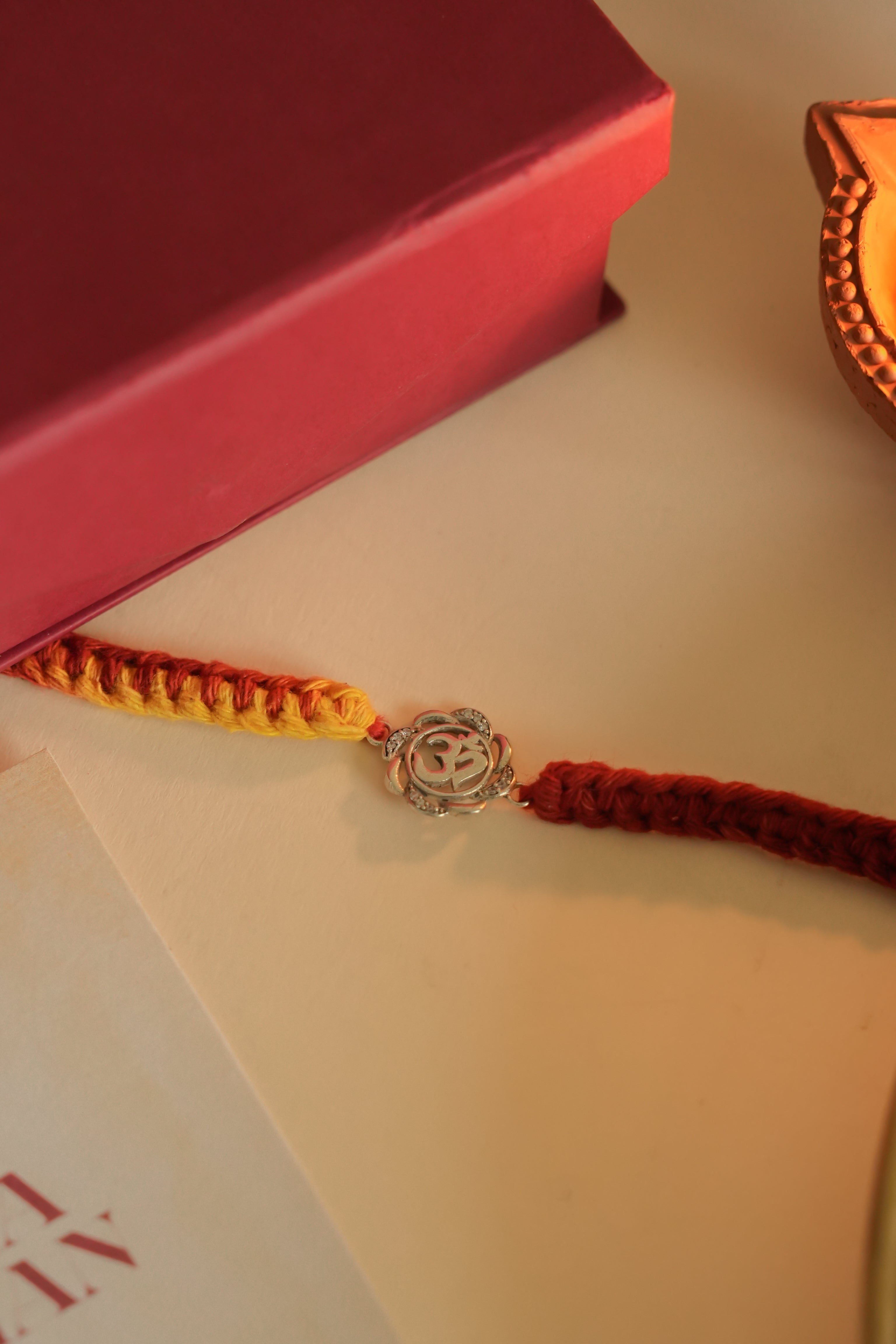 OM 925 Silver Rakhi